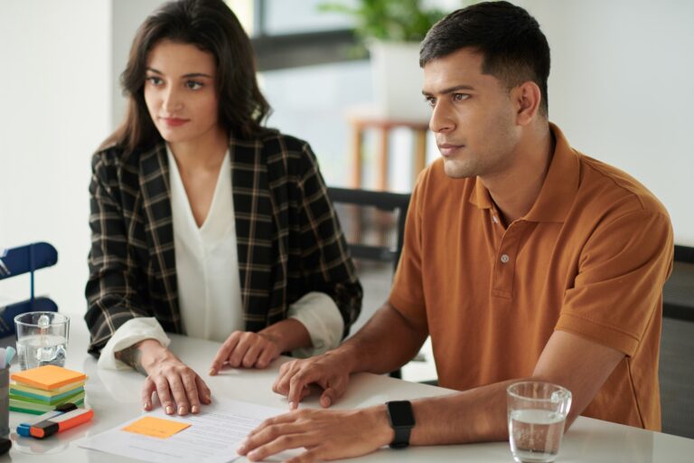 Young Couple Visiting Lawyer